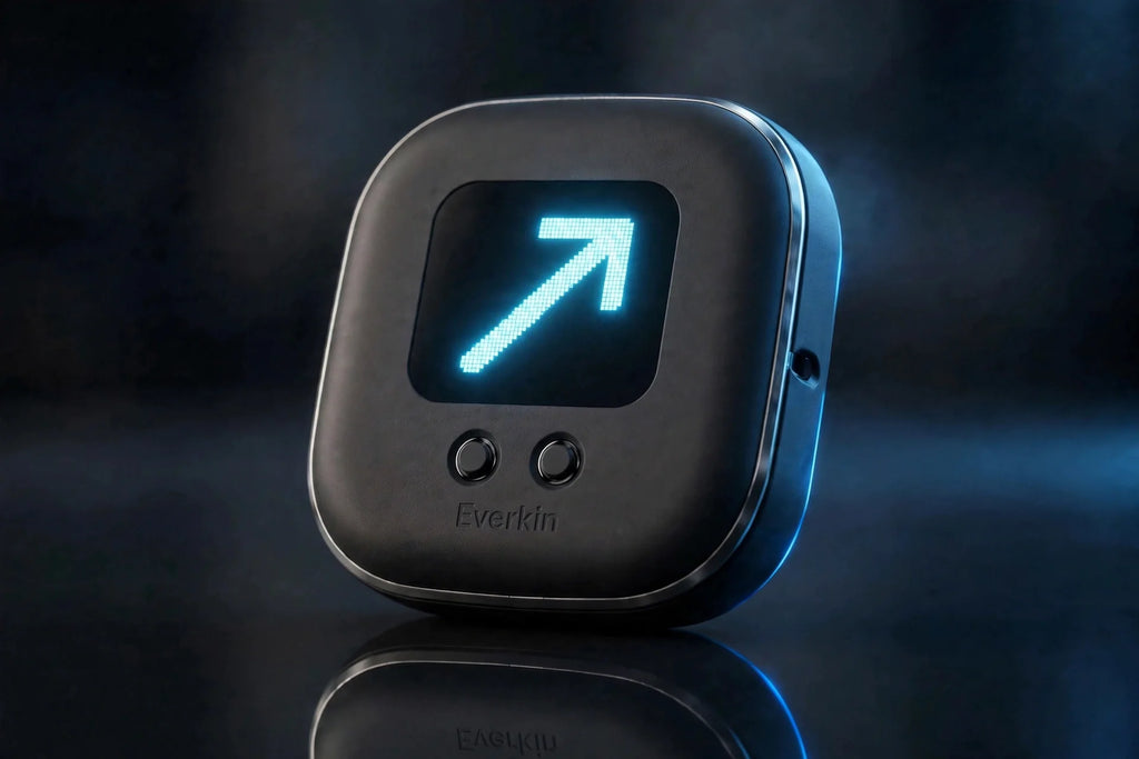 Everkin crew locator device in matte black with a glowing cyan arrow, studio product render